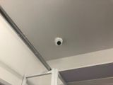 a camera mounted on the ceiling of a bathroom