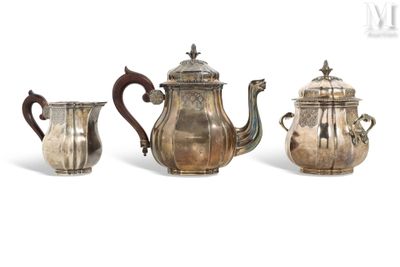 three pieces of silver tea and coffee set on a white background