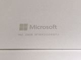 the back of a laptop with a microsoft logo on it