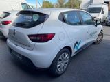 a white car that is parked in a parking lot