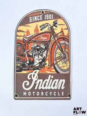 a sign that says indian motorcycle on the side of a building