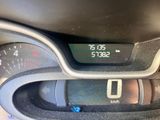 a close up of a car dashboard with a speedometer