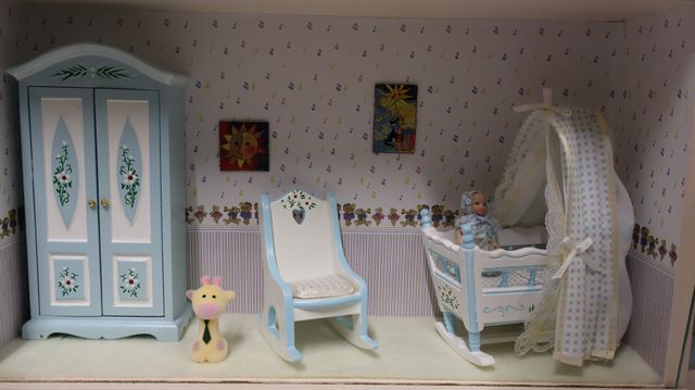 Diorama. Composition miniature, dans une vitrine en bois, vitre e...