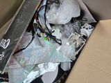 a cardboard box with a bunch of items inside of it