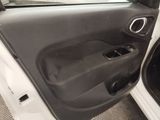 a picture of a car door with the door handle open