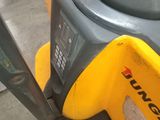 yellow and black machine with a black handle and a yellow handle