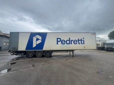 a semi truck that is parked in a parking lot