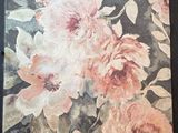 a picture of a painting of flowers on the wall