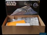 the box is open to show the contents of a star wars model