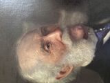 painting of an old man with a white beard wearing a suit and tie