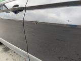 a car that has a hole in the side of it