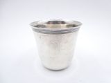 an antique silver cup on a white background with a white background