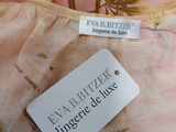 a label on a dress with a flower pattern on it