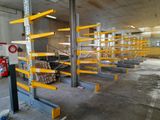 a large warehouse with a lot of shelves and pallets
