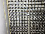 a picture of a wine rack in a wine cellar