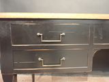 a black desk with two drawers and a wooden top
