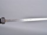 a knife that is laying on top of a table