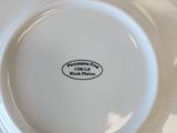 a white plate that has a black and white label on it