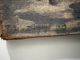 a close up of a piece of fabric on a toilet