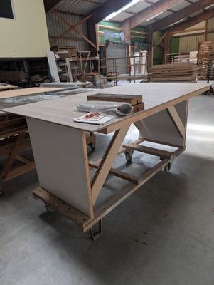 an image of a workbench in a warehouse