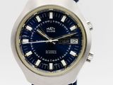 an image of a close up of a wrist watch with a blue strap