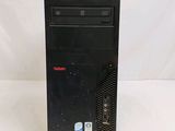 a close up of a desktop computer on a white surface