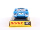 a blue toy car sitting on top of a yellow box