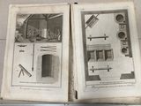 deux pages ouvertes d'un livre sur lesquelles figurent des dessins représentant une cuisine et un salon