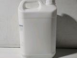 a white container that is sitting on the floor