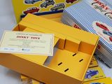 a yellow box that has some toys inside of it