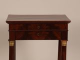 an image of a small table with a drawer on top of it