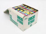 a box full of candy sitting on a white surface