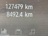 a blackboard with a picture of a car and a clock on it
