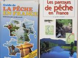 two books on a table with a map of france and a map of france
