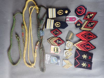 a lot of military items that are laying out on a table