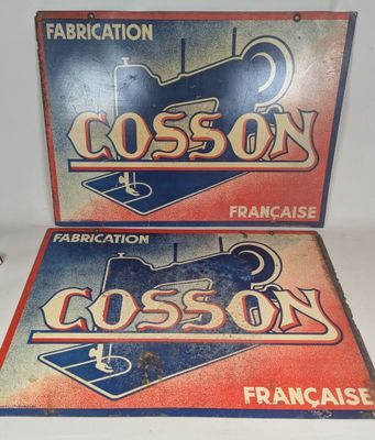 two advertising signs for a baseball team are displayed on a table