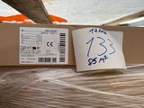 a box with a sticker on it sitting on a pallet