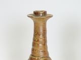 two vases that are sitting on a table