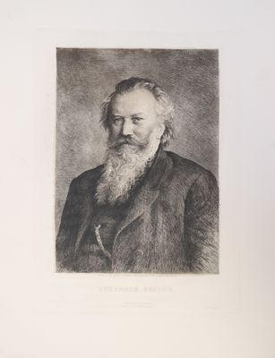 portrait d'un homme à la longue barbe, en costume-cravate