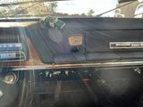a view of a dashboard from inside a car
