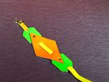 a paper kite that is shaped like an orange and green kite