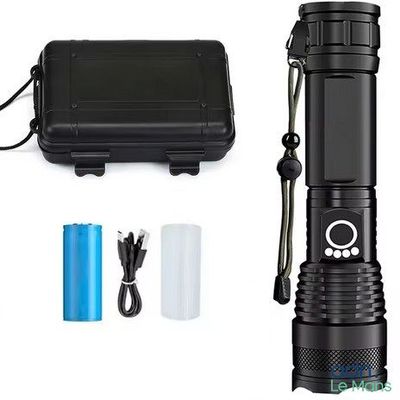 an image of a flashlight with a battery and charger