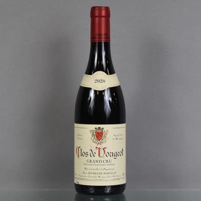 a bottle of wine that is sitting on a table