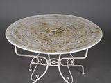 an image of a white table with a circular design on it