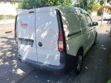 a van that is parked on the side of the street