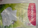a bag of toilet paper that is wrapped in plastic