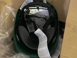 a helmet that is sitting in a box on the floor