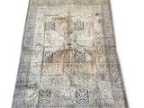 an old rug on a white background