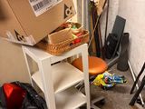 a cart with a box on top of it in a room