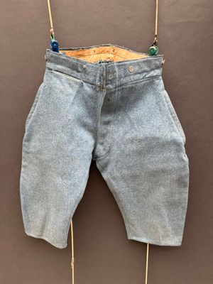 an image of a pair of jeans hanging on a clothes line